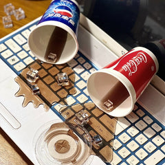 3D Simulation Spilled Drink Phone Stand - Creative Desktop Ornament & Novelty Phone Holder - Realistic Fake Soda & Coffee Cup Decor for Office and Home