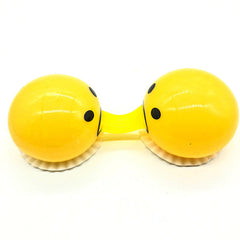 Funny Stress Relief Squeeze Toy - Creative Vomiting Egg Yolk Character with Yellow Slime for Novelty Gags and Sensory Play