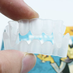 Glow-in-the-Dark Vampire Fangs - Luminous Zombie Dentures for Halloween Costumes - Spooky Party Favors and Costume Accessories for Kids and Adults